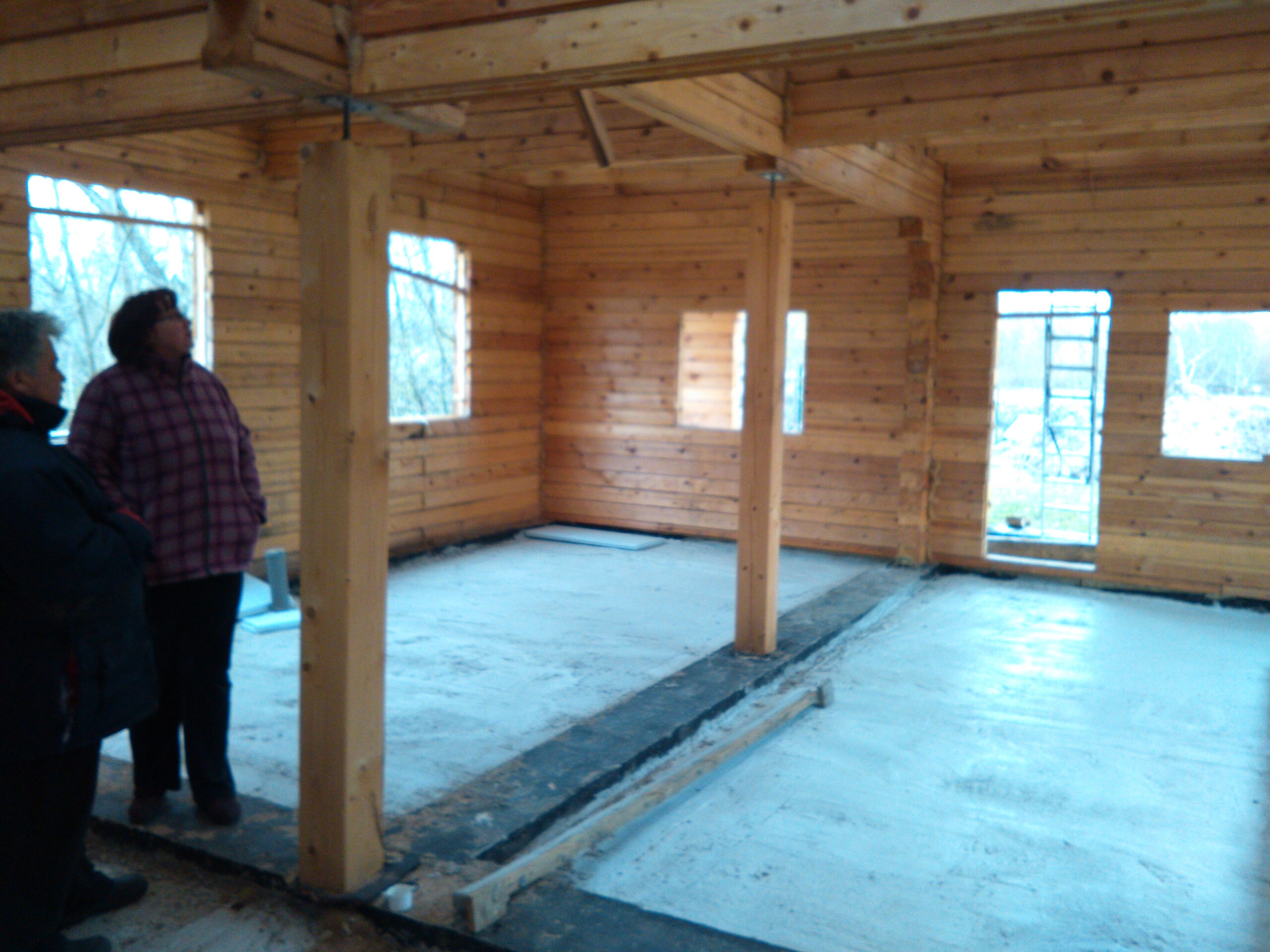 Reparation av en träfasad i Sverige.