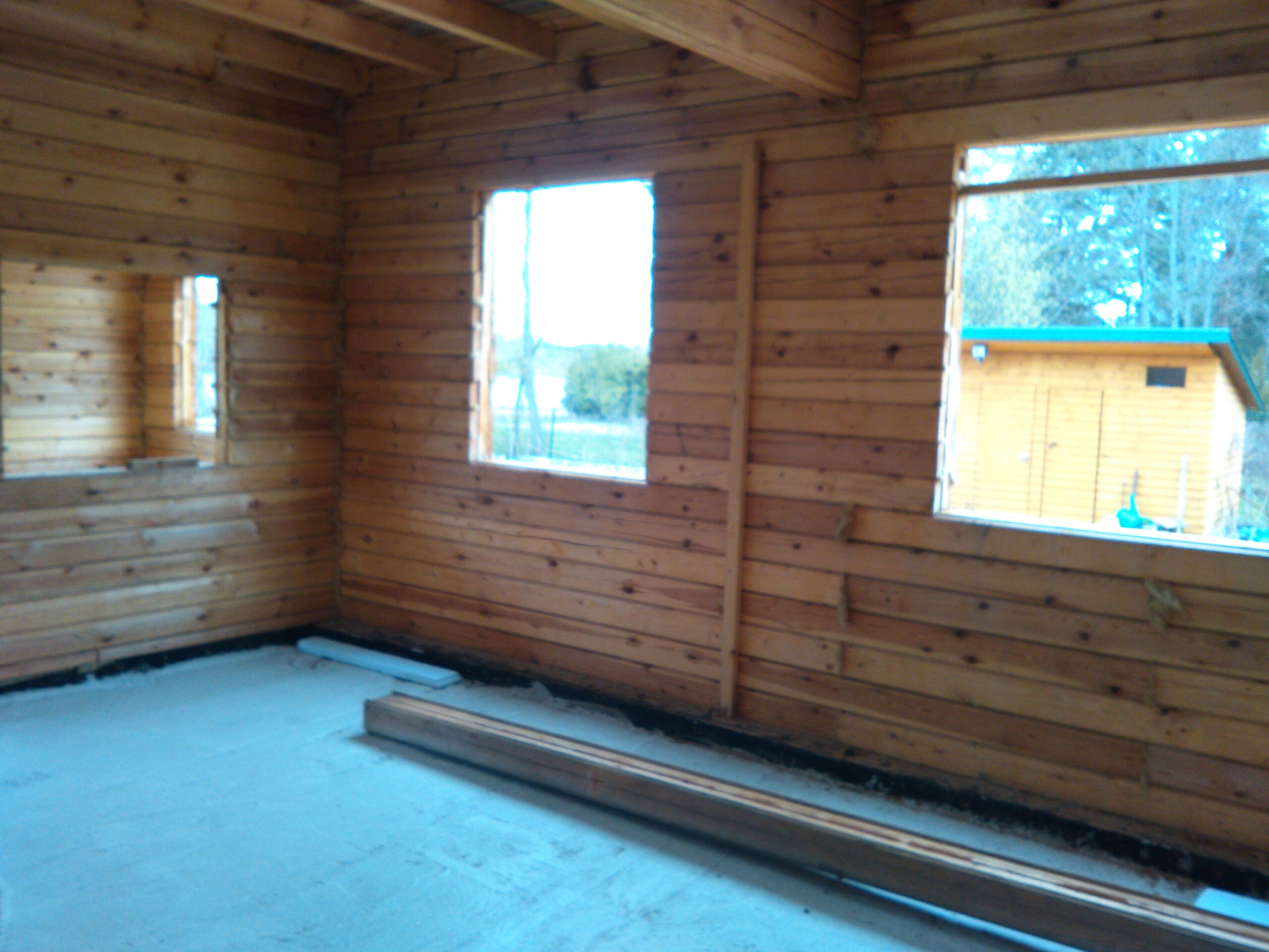 Reparation av en träfasad i Sverige.